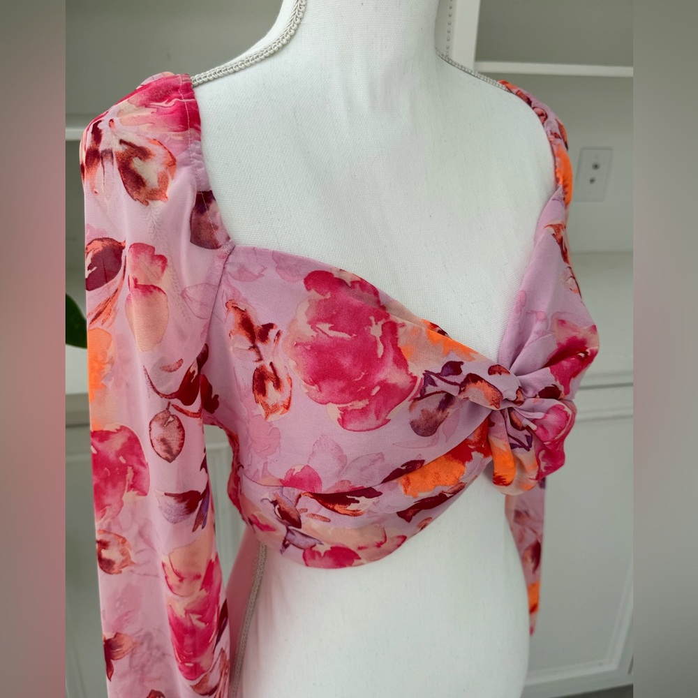 Pink sheer floral top.
